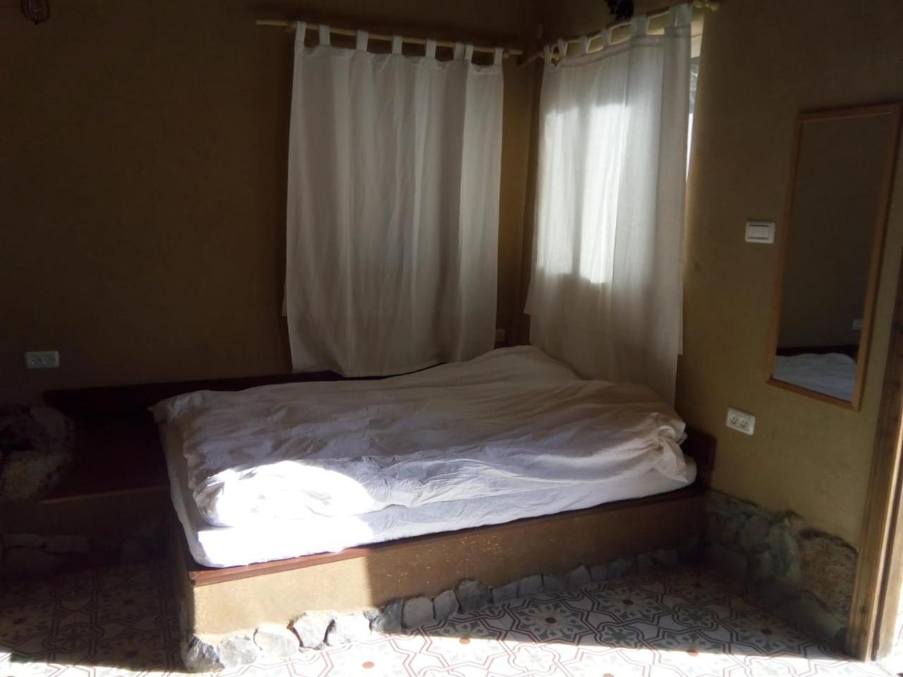 Earth Zimmer El Rom Buitenkant foto